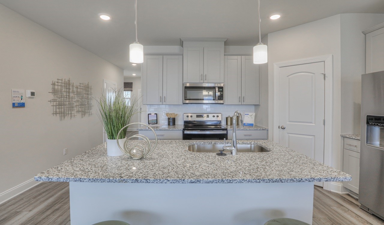 4677 Ridge Bend Drive Nashville, TN 37207 - Photo 4 of 14 a kitchen with sink a microwave and cabinets
