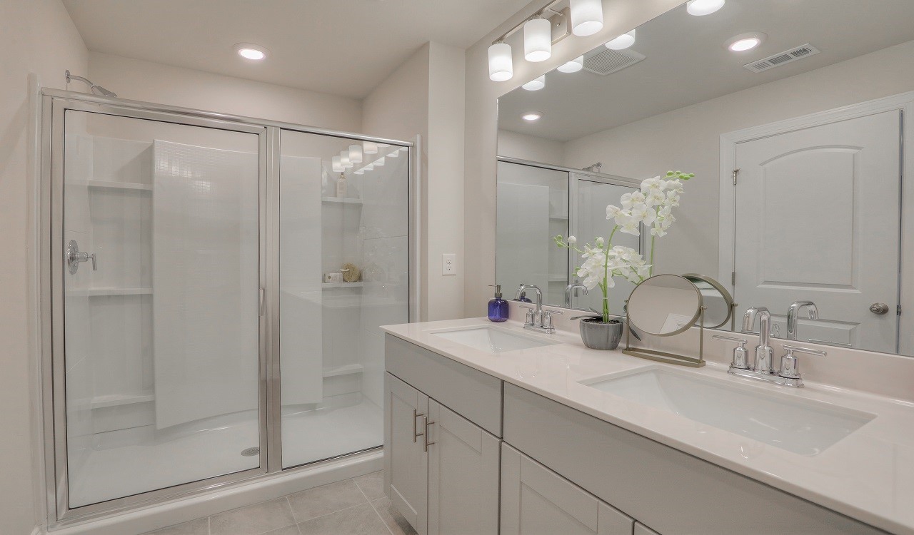4677 Ridge Bend Drive Nashville, TN 37207 - Photo 9 of 14 a bathroom with double sink and a mirror