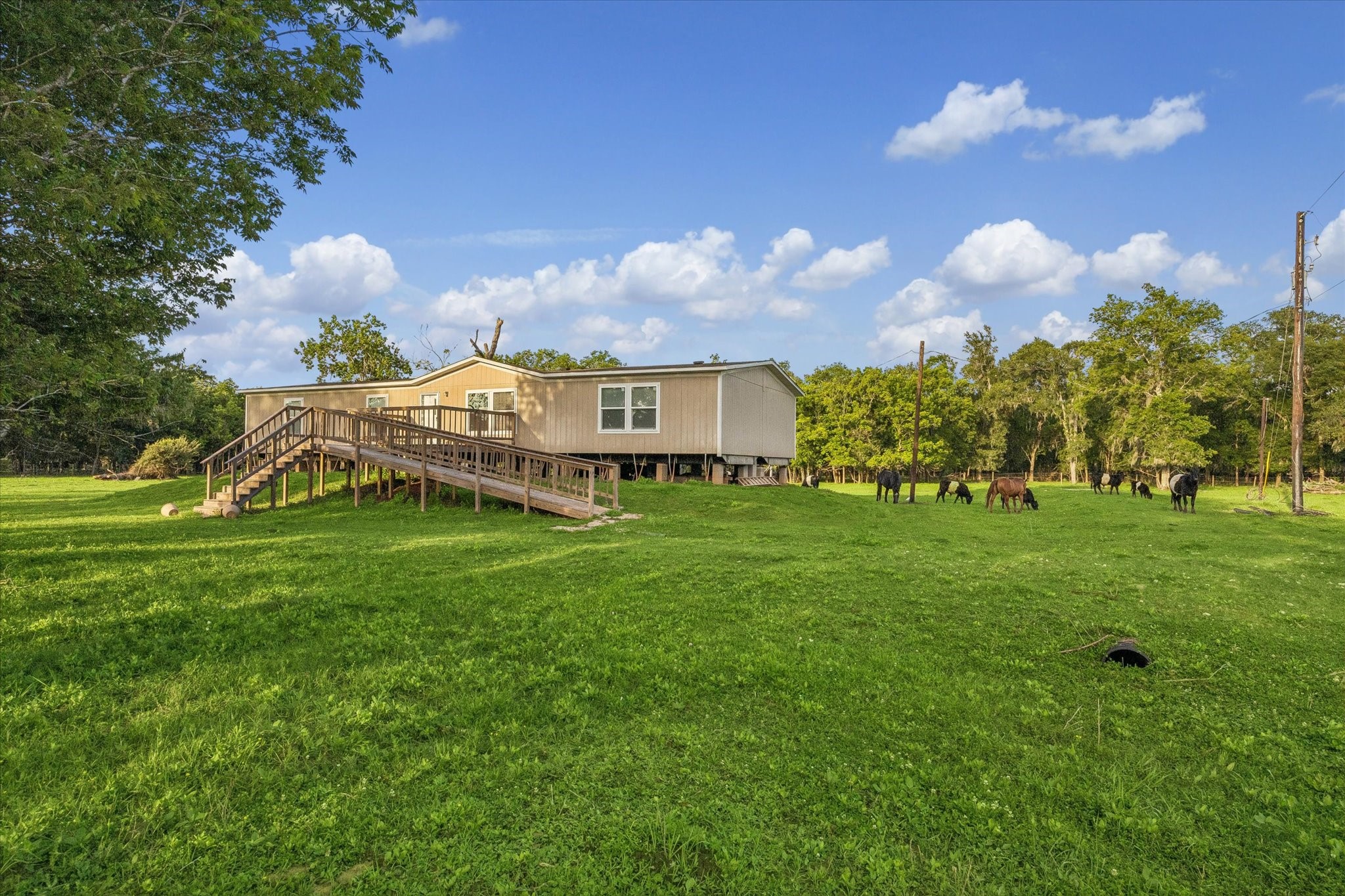 3515 County Road 36 Angleton, TX 77515 - Photo 48 of 50 a view of a house with a big yard