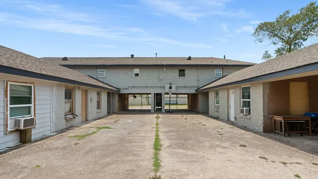 a front view of a house with a outdoor space