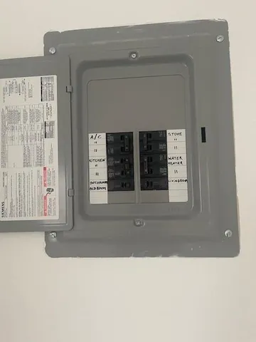 a black and white photo of a living room