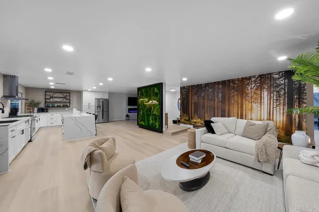 a bedroom with two beds and painting on the wall