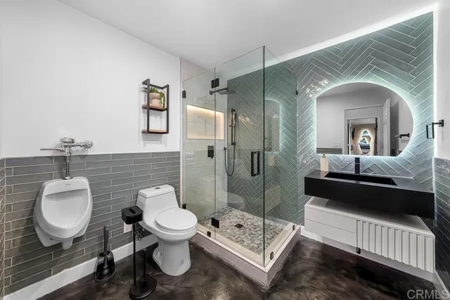 a bathroom with a bathtub and a sink