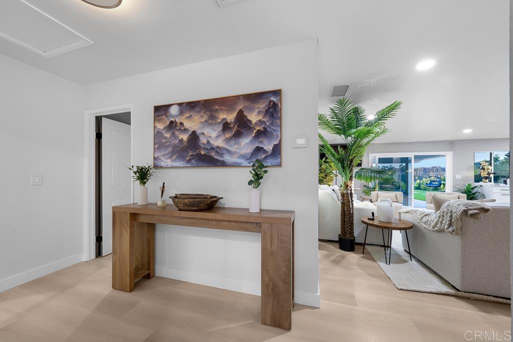 1286 Rippey Street El Cajon, CA 92020 - Photo 33 of 74 a living room with furniture and a potted plant