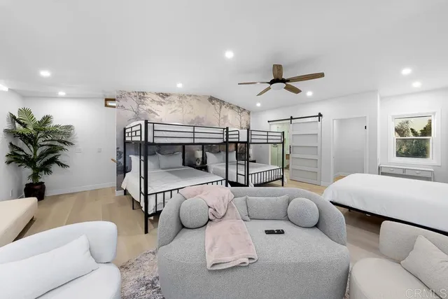 a front view of house with yard and outdoor seating