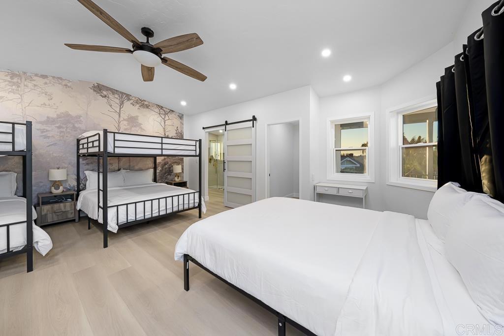 1286 Rippey Street El Cajon, CA 92020 - Photo 36 of 74 a bedroom with bed and window