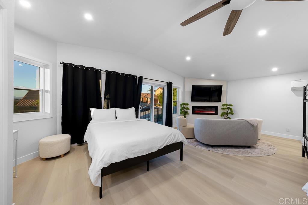 1286 Rippey Street El Cajon, CA 92020 - Photo 38 of 74 a living room with furniture and a flat screen tv