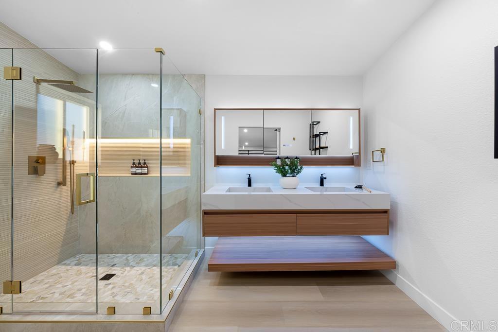 1286 Rippey Street El Cajon, CA 92020 - Photo 39 of 74 a bathroom with a tub and shower