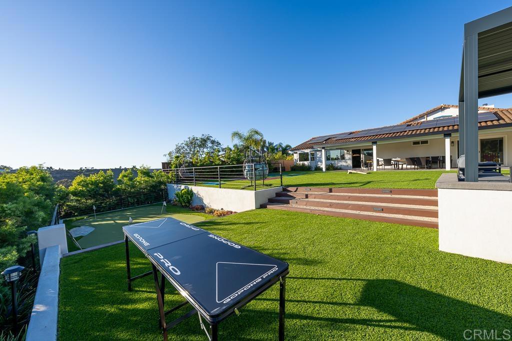 1286 Rippey Street El Cajon, CA 92020 - Photo 50 of 74 a view of a house with a yard porch and sitting area