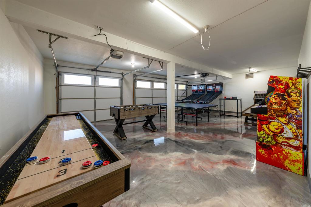 1286 Rippey Street El Cajon, CA 92020 - Photo 56 of 74 a living room with furniture and a flat screen tv