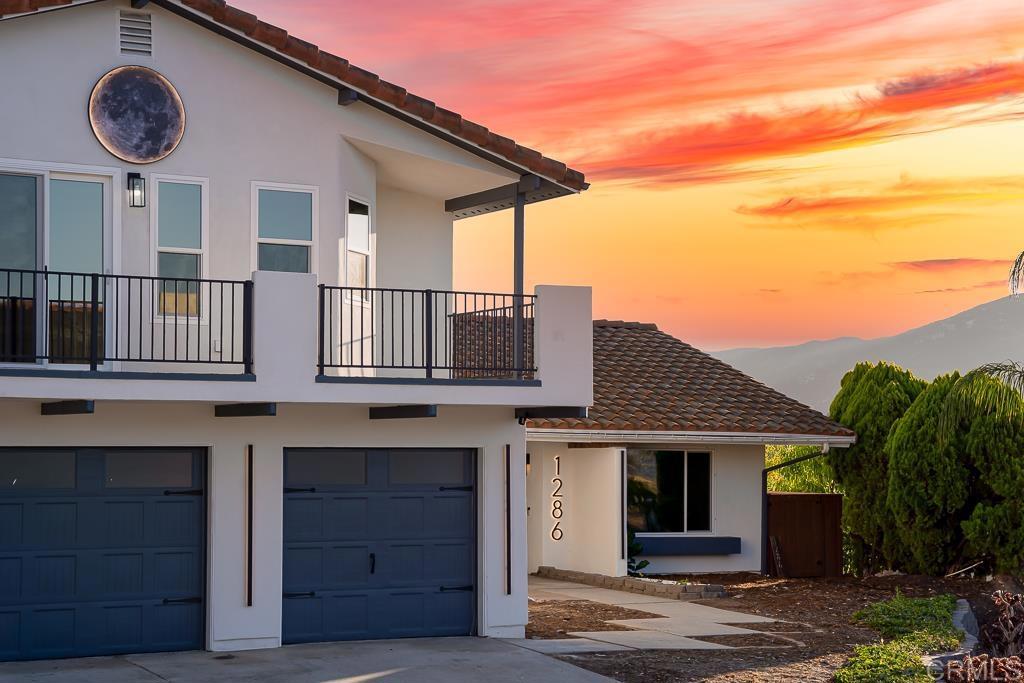 1286 Rippey Street El Cajon, CA 92020 - Photo 63 of 74 a front view of a house with balcony
