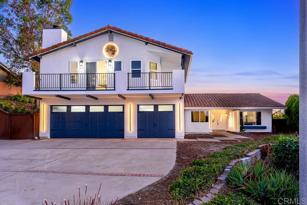 1286 Rippey Street El Cajon, CA 92020 - Photo 67 of 74 a front view of a house with a garden