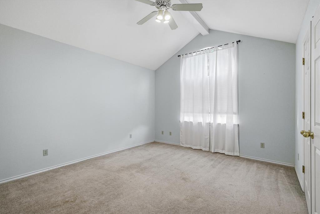 290 Sycamore Street Van, TX 75790 - Photo 24 of 38 an empty room with chandelier fan and windows