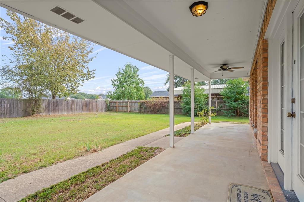 290 Sycamore Street Van, TX 75790 - Photo 29 of 38 a view of a garden with an outdoor space