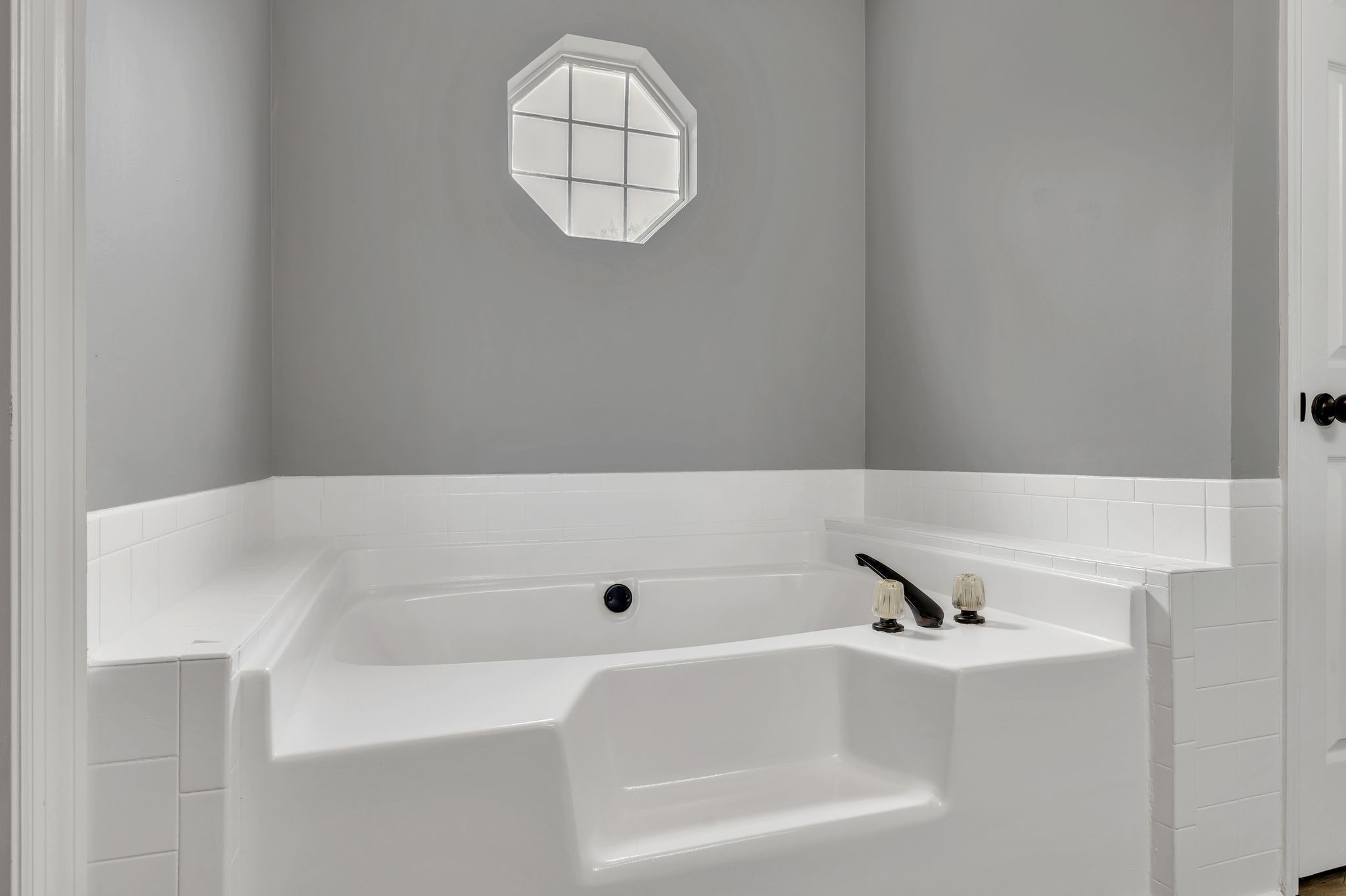 408 Hampstead South Antioch, TN 37013 - Photo 22 of 34 a bathroom with a bathtub