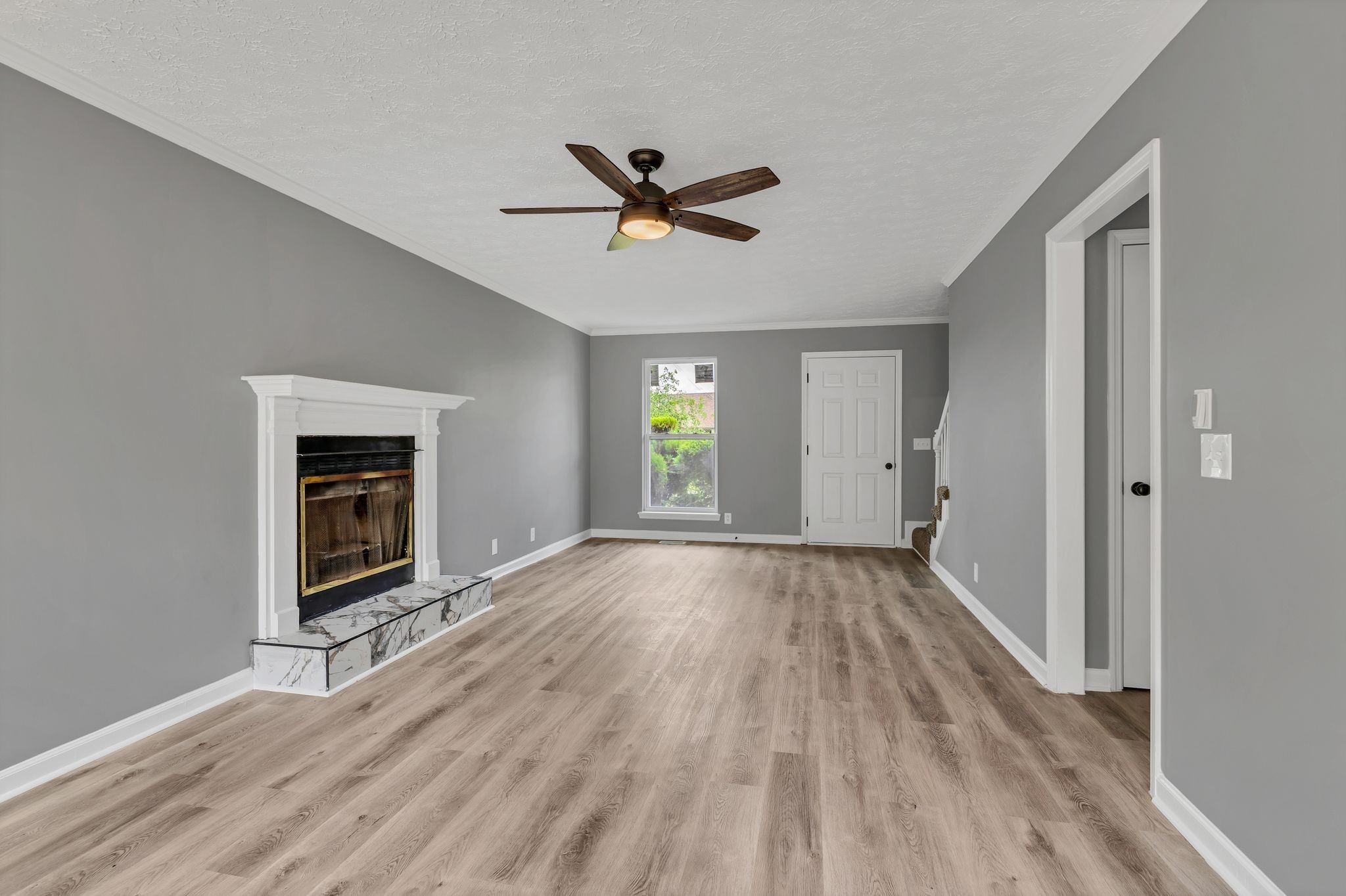 408 Hampstead South Antioch, TN 37013 - Photo 6 of 34 wooden floor in an empty room with a window