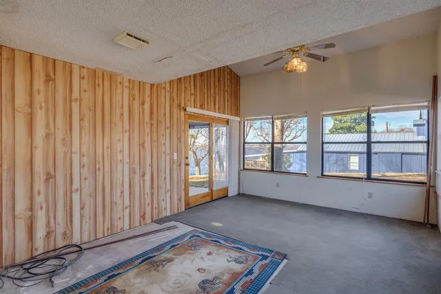 a view of an empty room and window