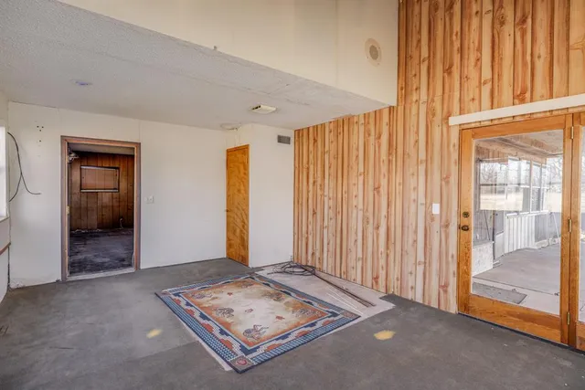 a kitchen with a sink appliances and cabinets