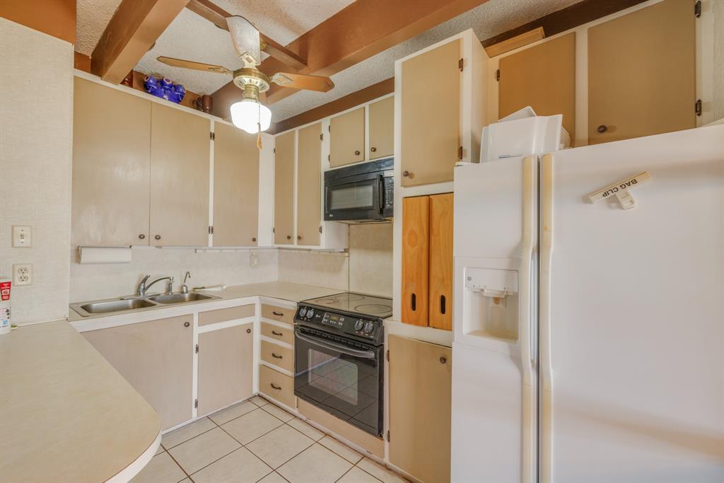 5 Angels Breath Road Abilene, TX 79601 - Photo 15 of 40 a kitchen with a sink appliances and cabinets