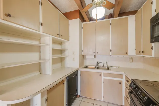 a view of a livingroom with a furniture and a chandelier
