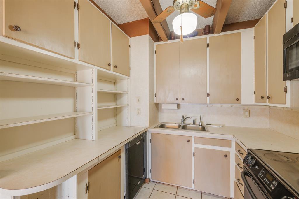 5 Angels Breath Road Abilene, TX 79601 - Photo 16 of 40 a kitchen with a sink cabinets and window