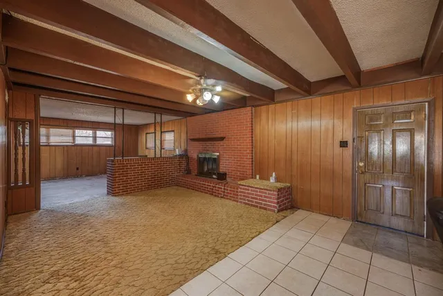 a view of a hallway with a room