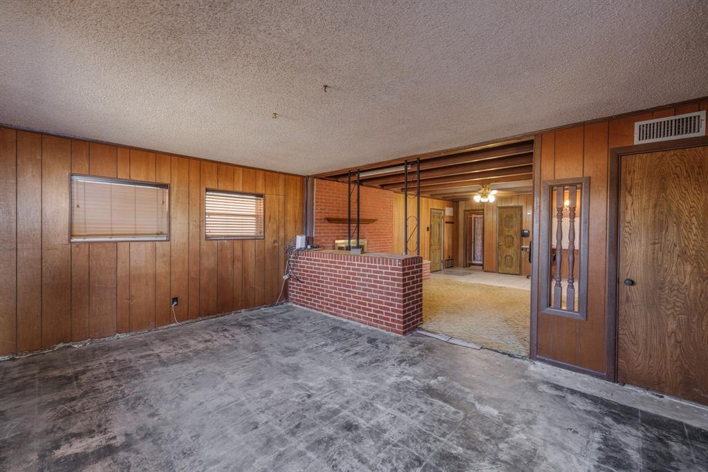 5 Angels Breath Road Abilene, TX 79601 - Photo 9 of 40 a view of empty room with wooden walls