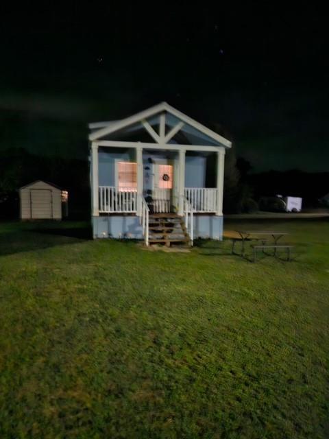 370 Sioux Quitman, TX 75783 - Photo 2 of 34 a front view of a house with a yard