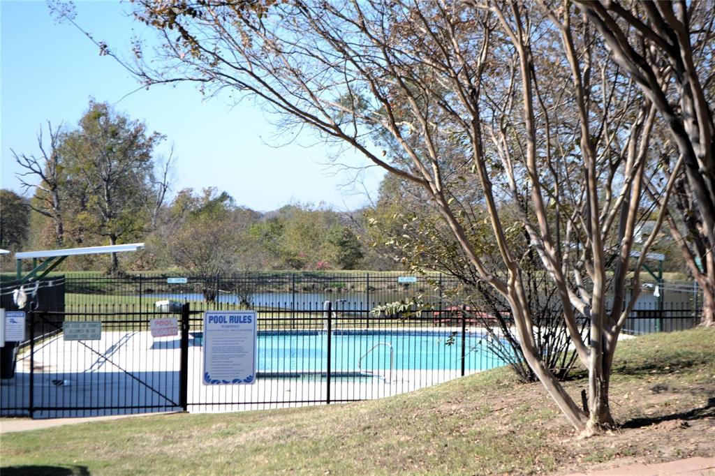 370 Sioux Quitman, TX 75783 - Photo 23 of 34 a view of a swimming pool with a patio