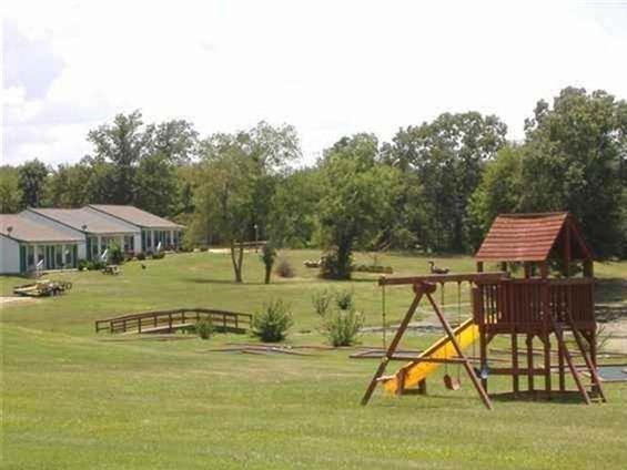 370 Sioux Quitman, TX 75783 - Photo 24 of 34 a view of a swimming pool with a patio