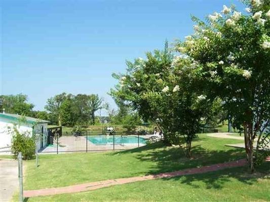 370 Sioux Quitman, TX 75783 - Photo 34 of 34 a view of a park with trees in the background