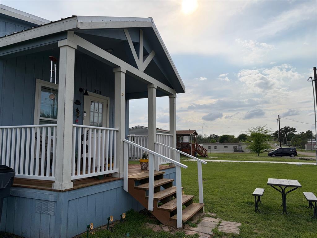 370 Sioux Quitman, TX 75783 - Photo 9 of 34 a view of a house with a yard