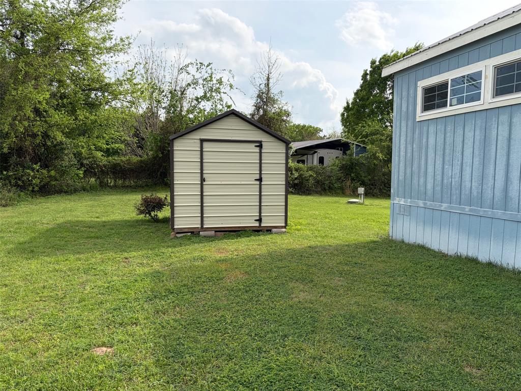 370 Sioux Quitman, TX 75783 - Photo 10 of 34 a view of a backyard of the house