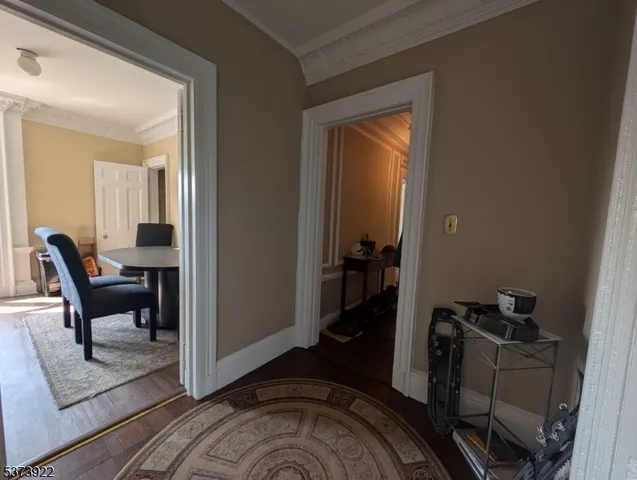 a room that has a bed and a chair in it