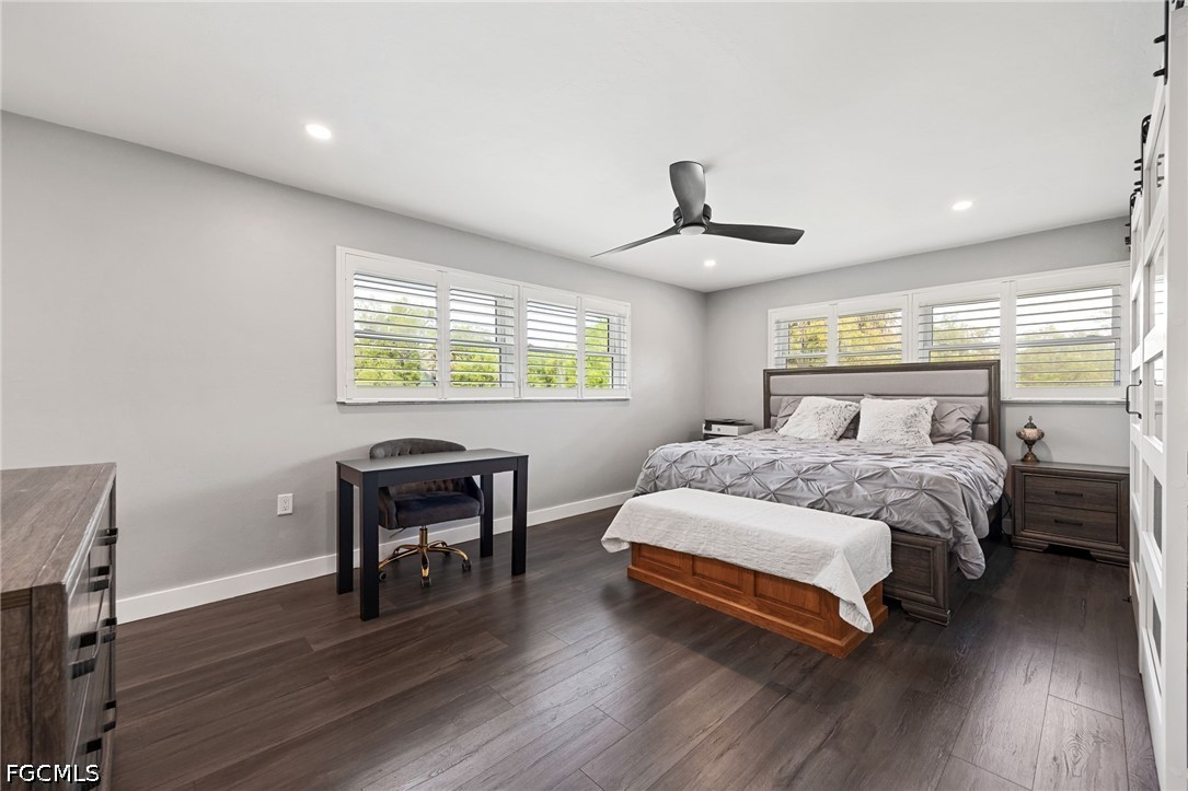 4220 Staley Road Fort Myers, FL 33905 - Photo 21 of 47 a bedroom with a bed and a table in it