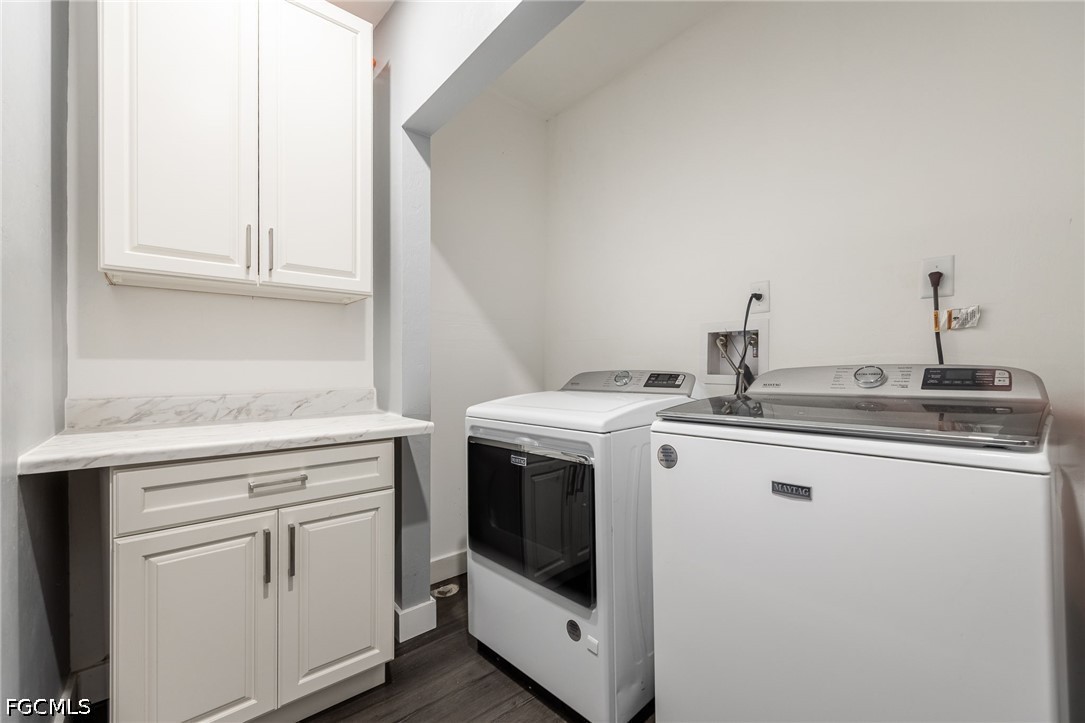 4220 Staley Road Fort Myers, FL 33905 - Photo 33 of 47 a kitchen with white cabinets and white appliances