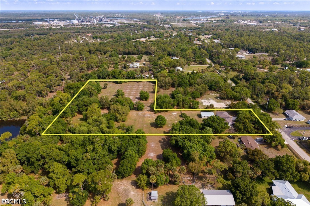 4220 Staley Road Fort Myers, FL 33905 - Photo 46 of 47 an aerial view of a house with a yard