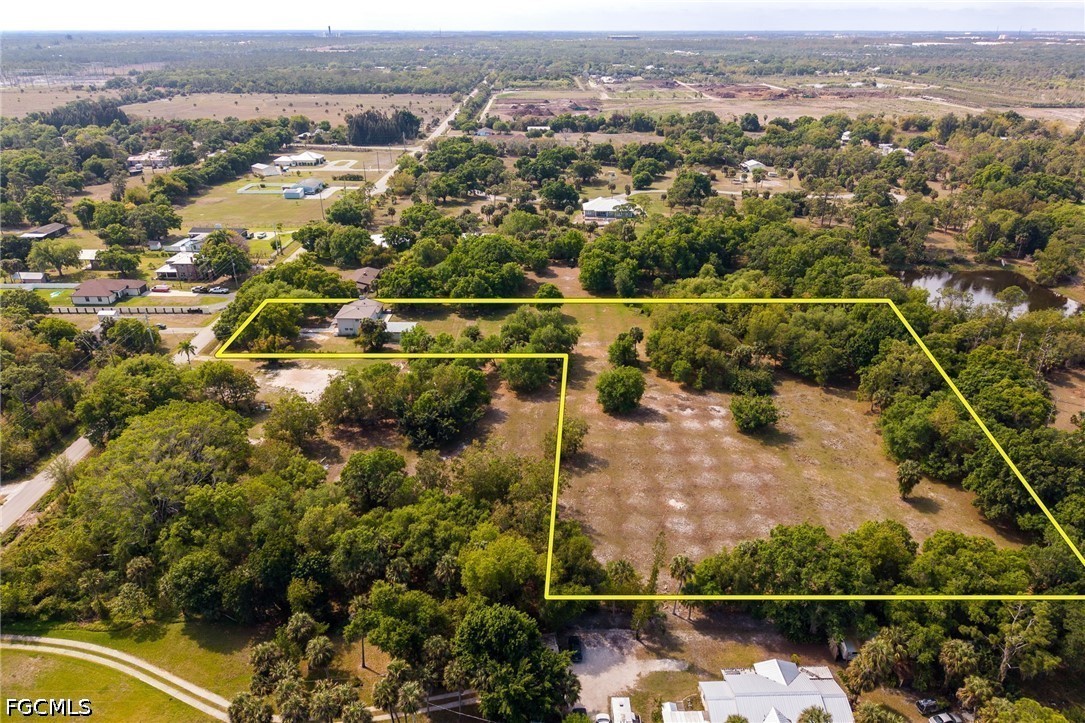 4220 Staley Road Fort Myers, FL 33905 - Photo 47 of 47 an aerial view of residential houses with outdoor space