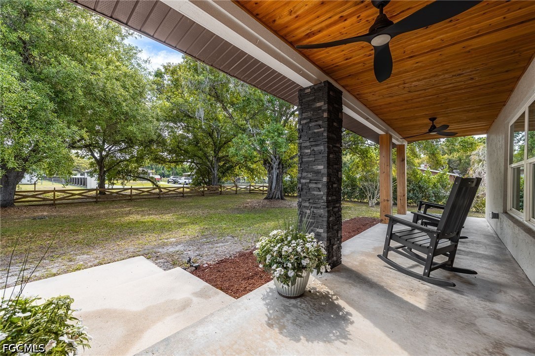 4220 Staley Road Fort Myers, FL 33905 - Photo 6 of 47 a view of a swimming pool with chairs in front of house