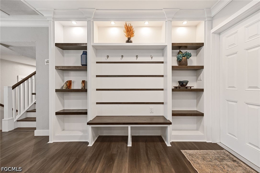 4220 Staley Road Fort Myers, FL 33905 - Photo 8 of 47 a view of entryway with wooden floor and cabinet