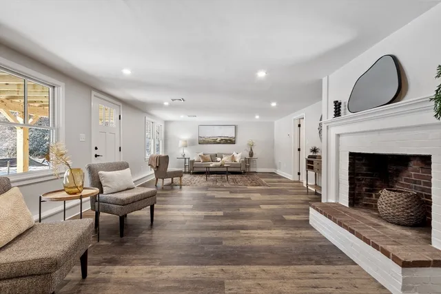 a living room with furniture or fireplace and a large window