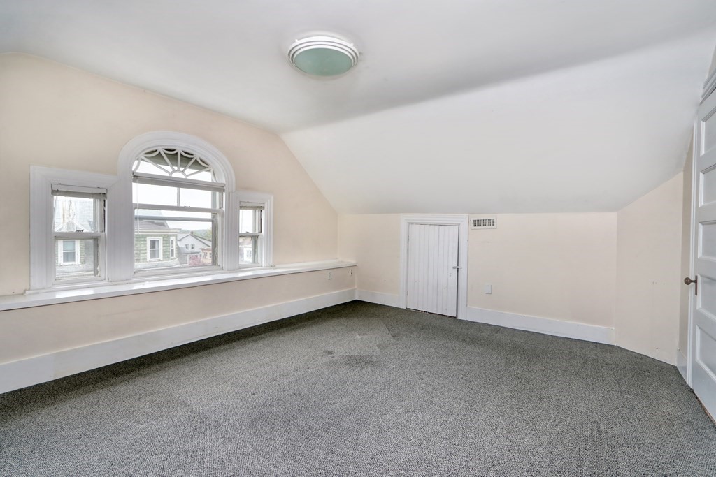 440 Broadway Somerville, MA 02145 - Photo 18 of 27 a view of an empty room with a window