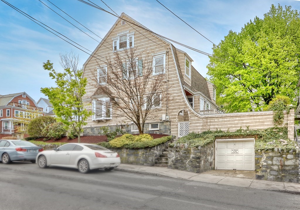 440 Broadway Somerville, MA 02145 - Photo 26 of 27 a front view of a house with a garden
