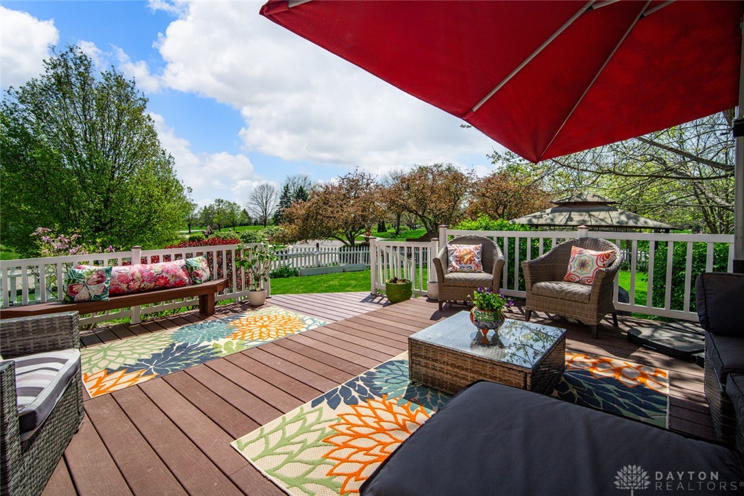 55 Janney Lane Springboro, OH 45066 - Photo 14 of 38 This spacious deck offers a tranquil retreat with ample room for outdoor entertaining and relaxation.
