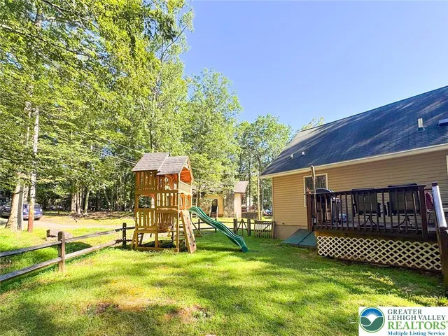 a view of a house with a swimming pool