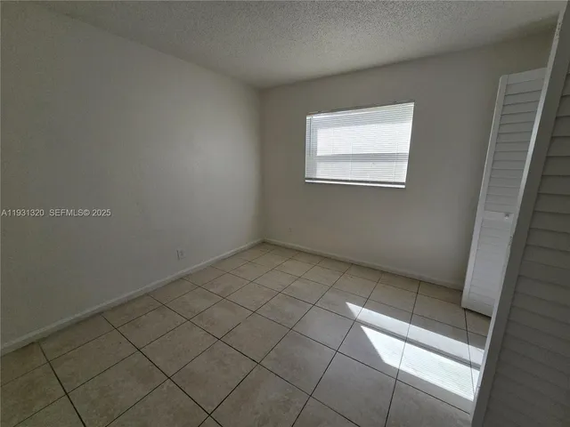 a view of a window in an empty room
