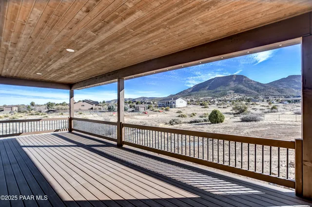 a view of a town with mountains in the background
