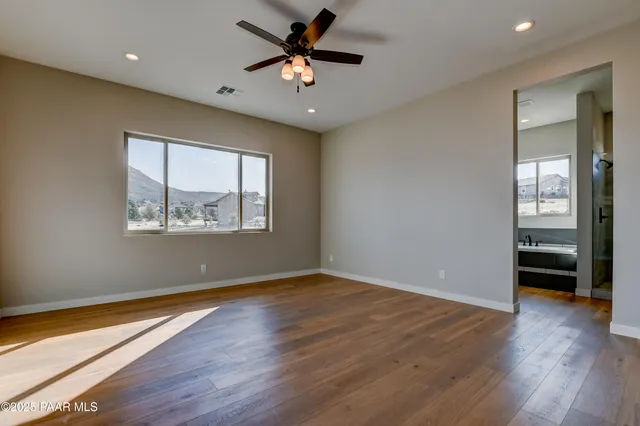 a bathroom with a sink double vanity and a mirror