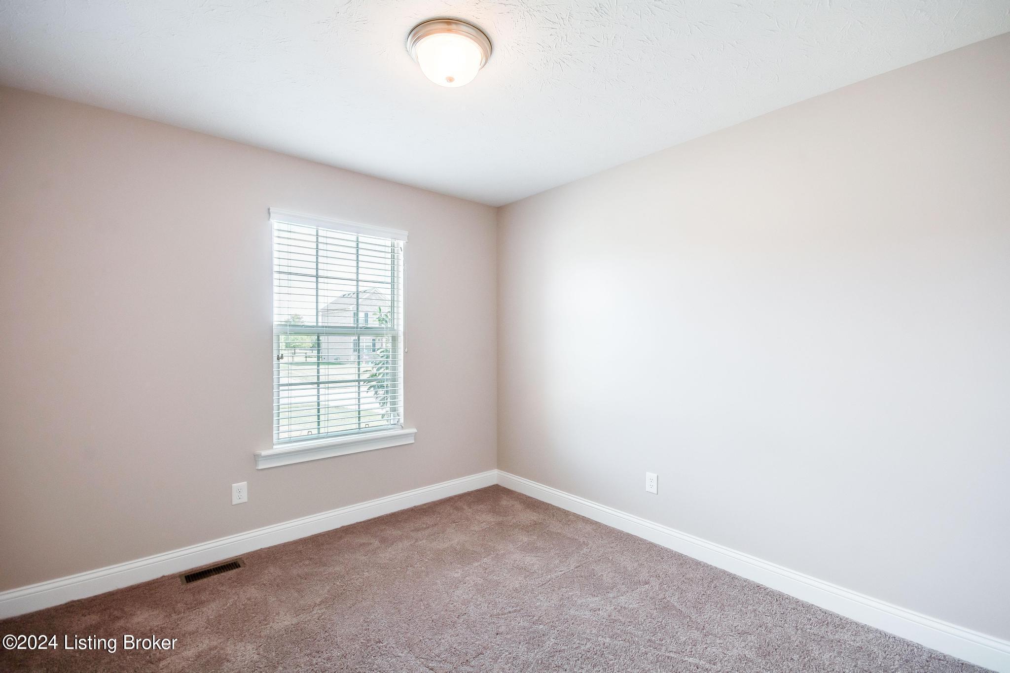 283 Autumn Ridge Drive Mount Washington, KY 40047 - Photo 22 of 41 Bedroom #3 with new carpeting, fresh coat of paint, double door closet, window and access to Full Bath #2.