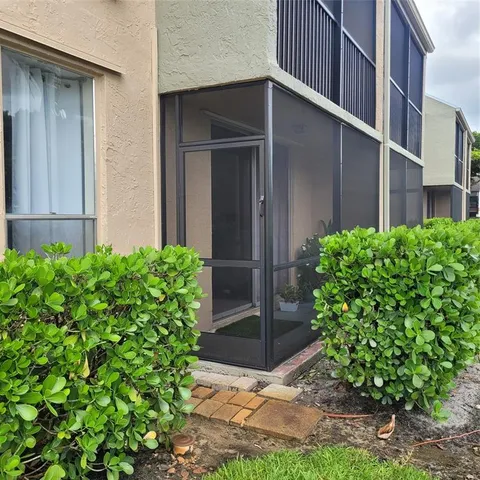 a plant that is in front of a house